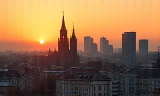 Historic buildings and modern skyline of Vienna at sunset